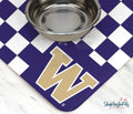 A close-up view of the corner of the ShopInstaPets Checkerboard Pet Placemat. thumbnail