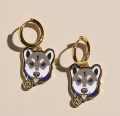 Photo of Nickel & Suede W Husky Head Huggies Earrings.